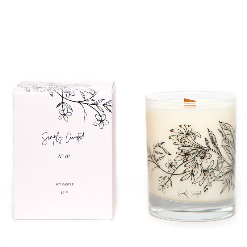 honeysuckle jasmine soy candle with floral illustration on the glass with a crackling wooden wick and a blush gift box